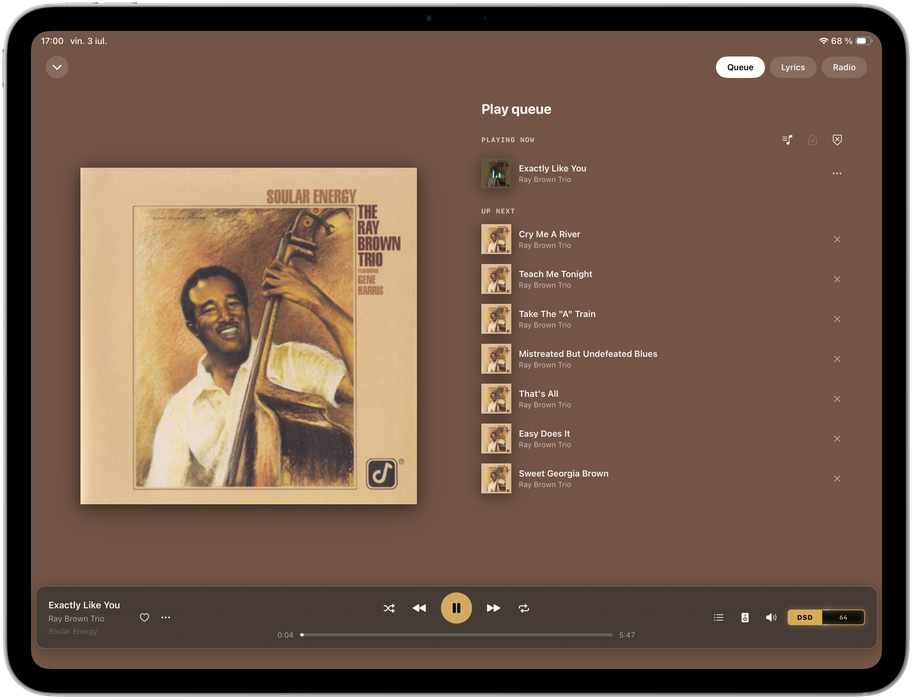 Serento on an iPad: now playing with the play queue alongside